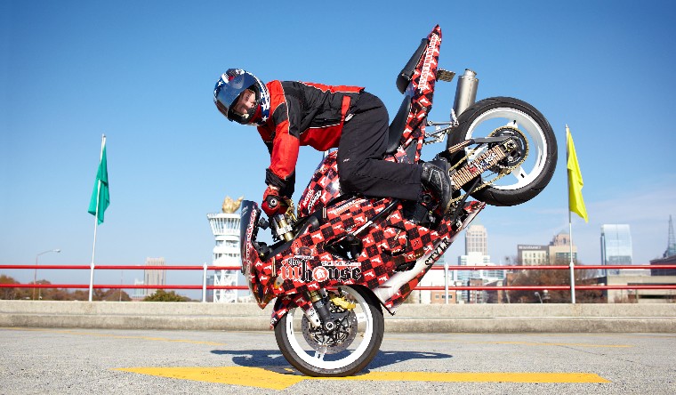 man on bike doing longest stoppie