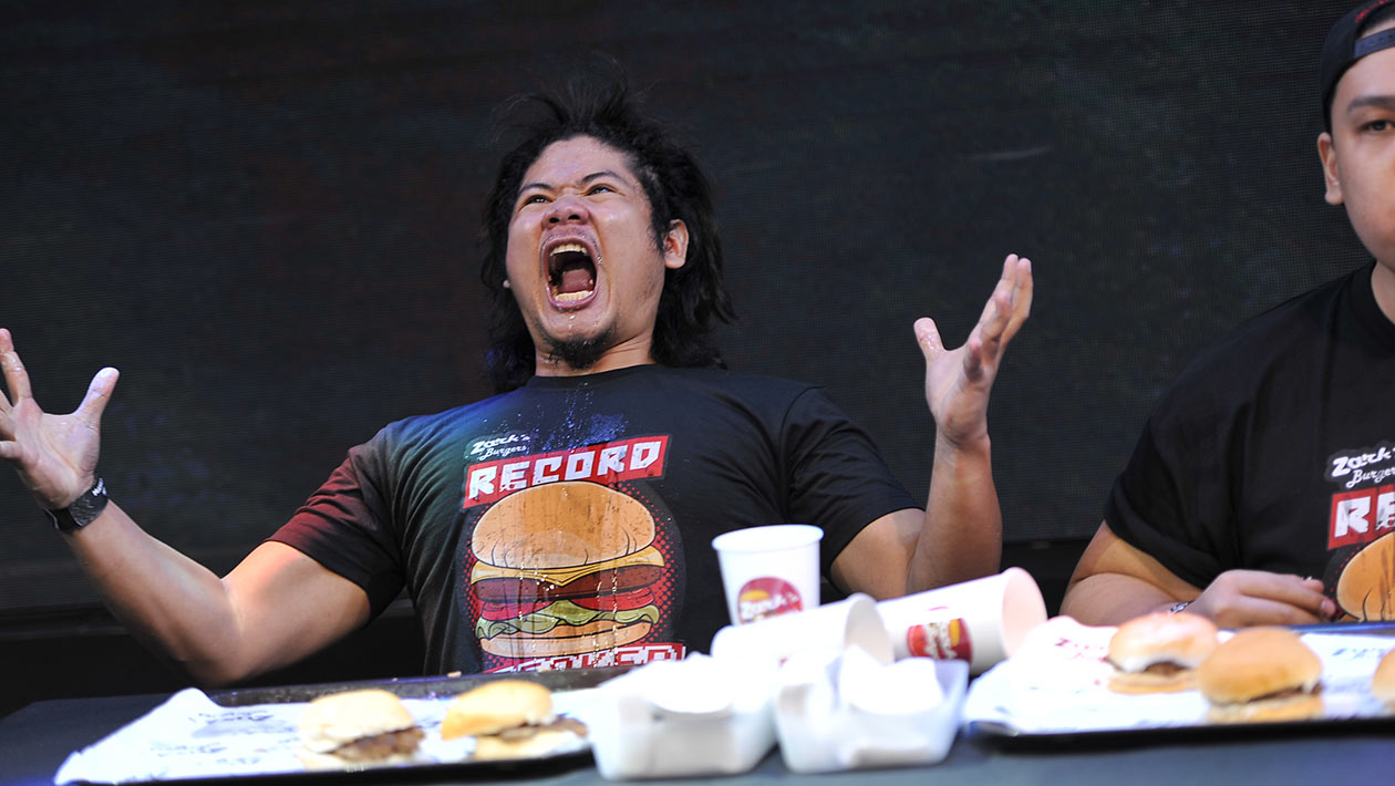 Most hamburgers eaten in one minute header