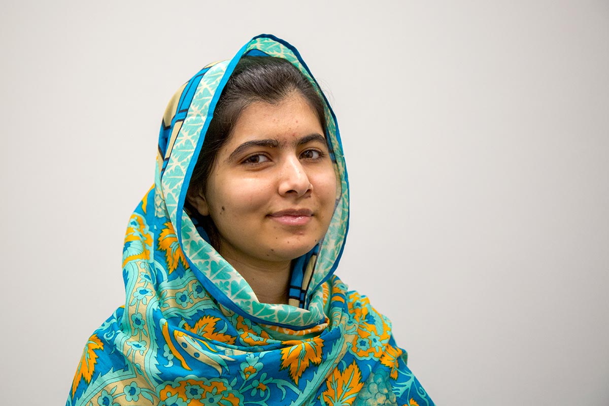 malala smiling in white background