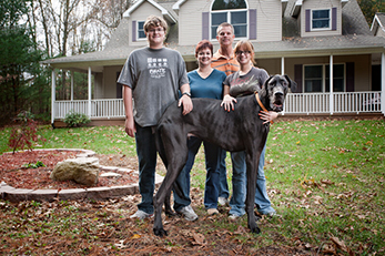 Zeus the tallest dog with family